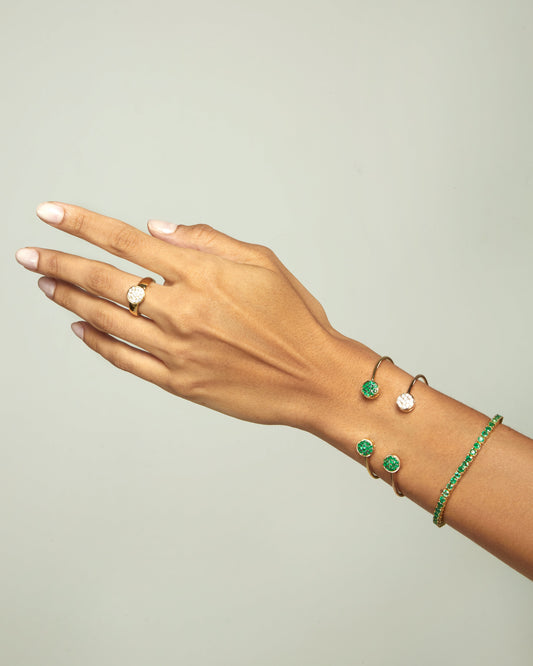 Resloute diamond and emerald bangle