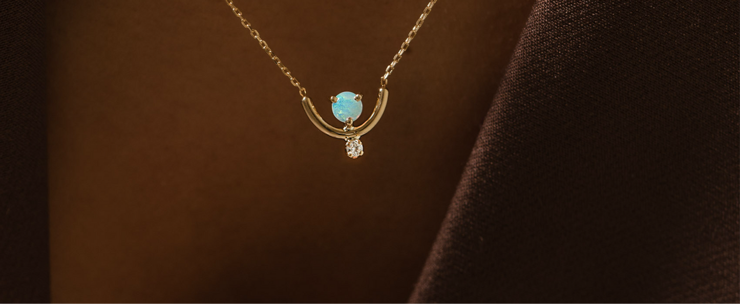 Opal crescent with diamonds necklace